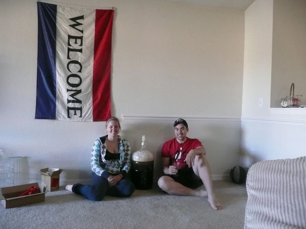 Early homebrew carboy and family photo