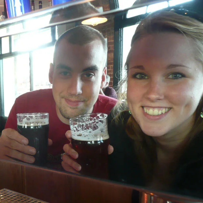 Jeremiah and Phylicia sharing beer